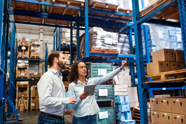 warehouse manager in warehouse using erp business management software